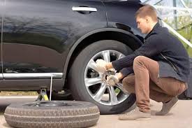 How to Change a Tire Without Panicking on the Side of the Road How to Change a Tire